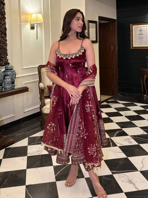 Women wearing Aarohi Maroon Anarkali Suit Set with Zari_SequinsWork from lahariya in her house