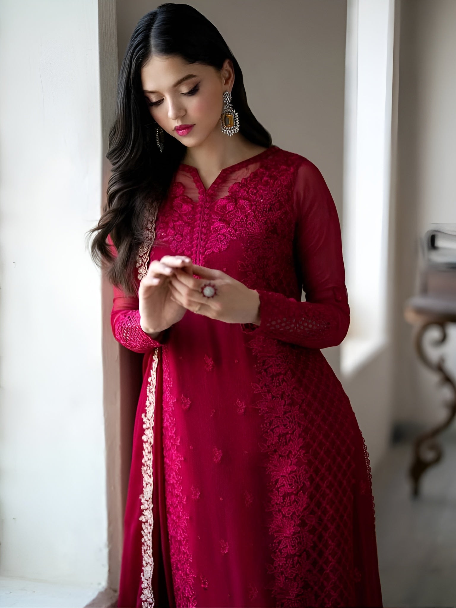 Woman wearing Aarohi Wine Luxury Embroidered Suit-Lahariya.com