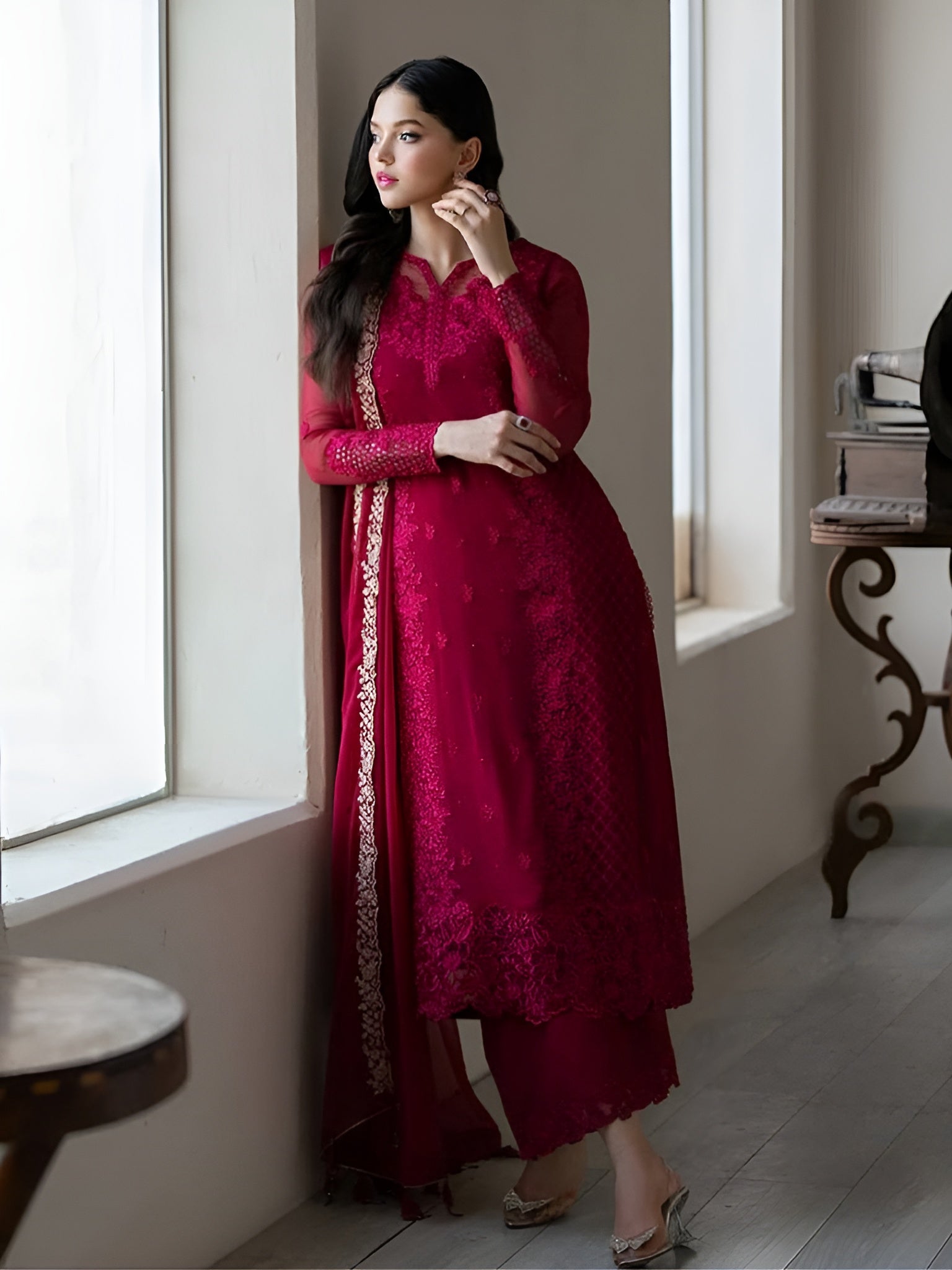 Woman wearing Aarohi Wine Luxury Embroidered Suit-Lahariya.com