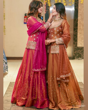 Women wearing Charvi Designer Lengha Suit Set with Exquisite Embroidery Work-Lahariya.com