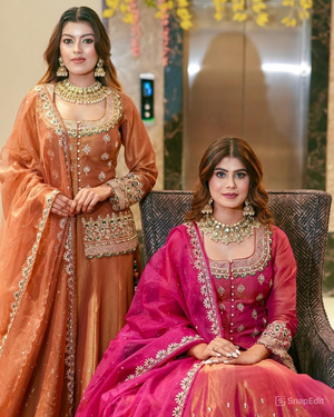 Women wearing Charvi Designer Lengha Suit Set with Exquisite Embroidery Work-Lahariya.com