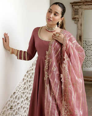 women wearing Ira Roman Silk Anarkali Palazzo Suit with Banarasi Dupatta in her house