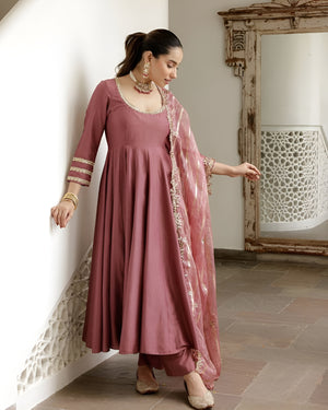 women wearing Ira Roman Silk Anarkali Palazzo Suit with Banarasi Dupatta in her house