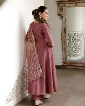 women wearing Ira Roman Silk Anarkali Palazzo Suit with Banarasi Dupatta in her house