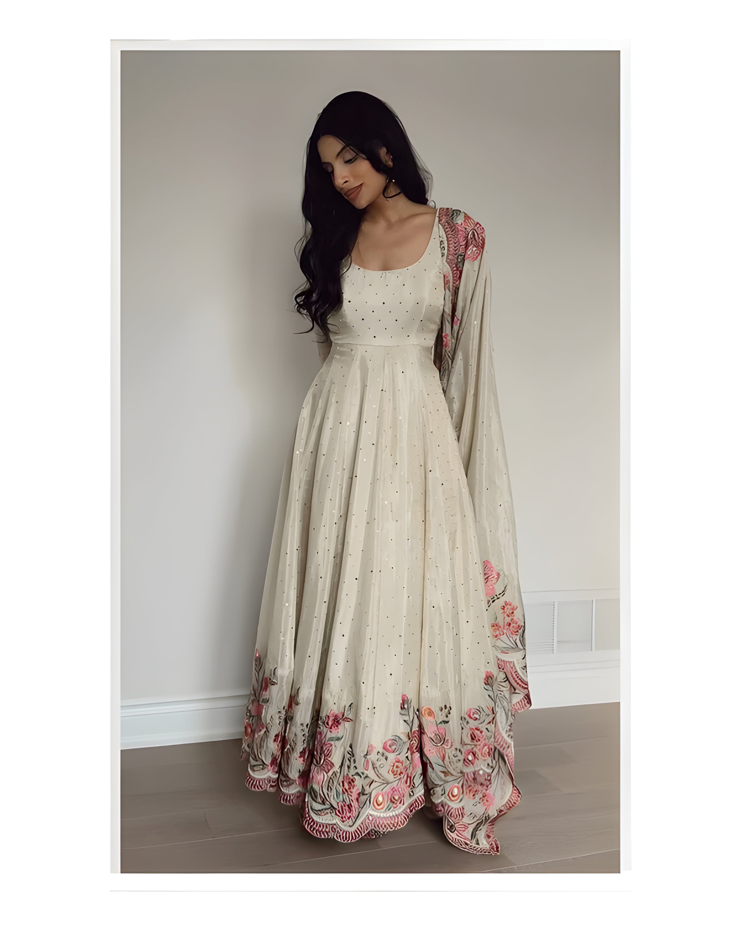 Woman wearing a floral dress with a plain background