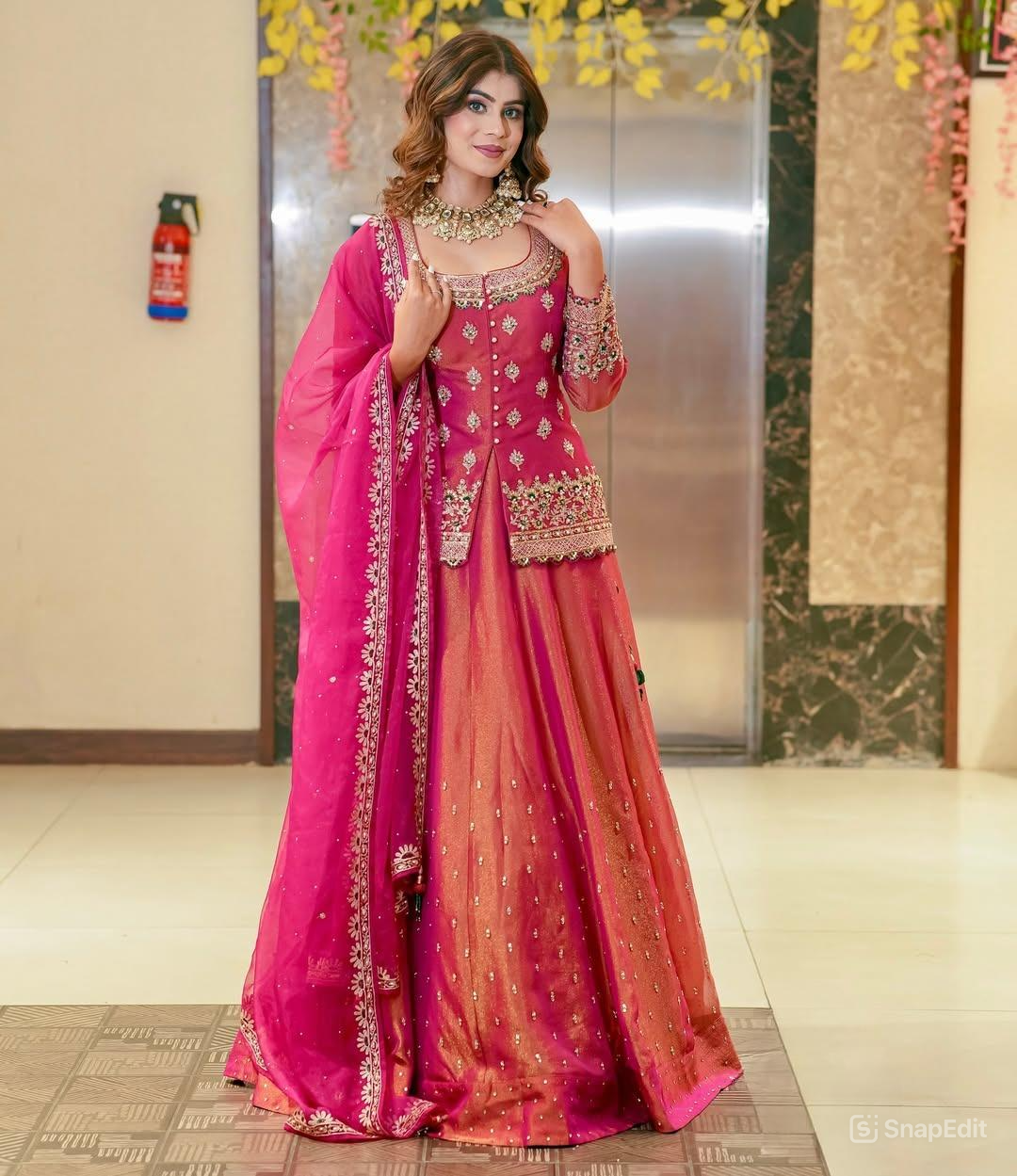 Women wearing Charvi Designer Lengha Suit Set with Exquisite Embroidery Work-Lahariya.com