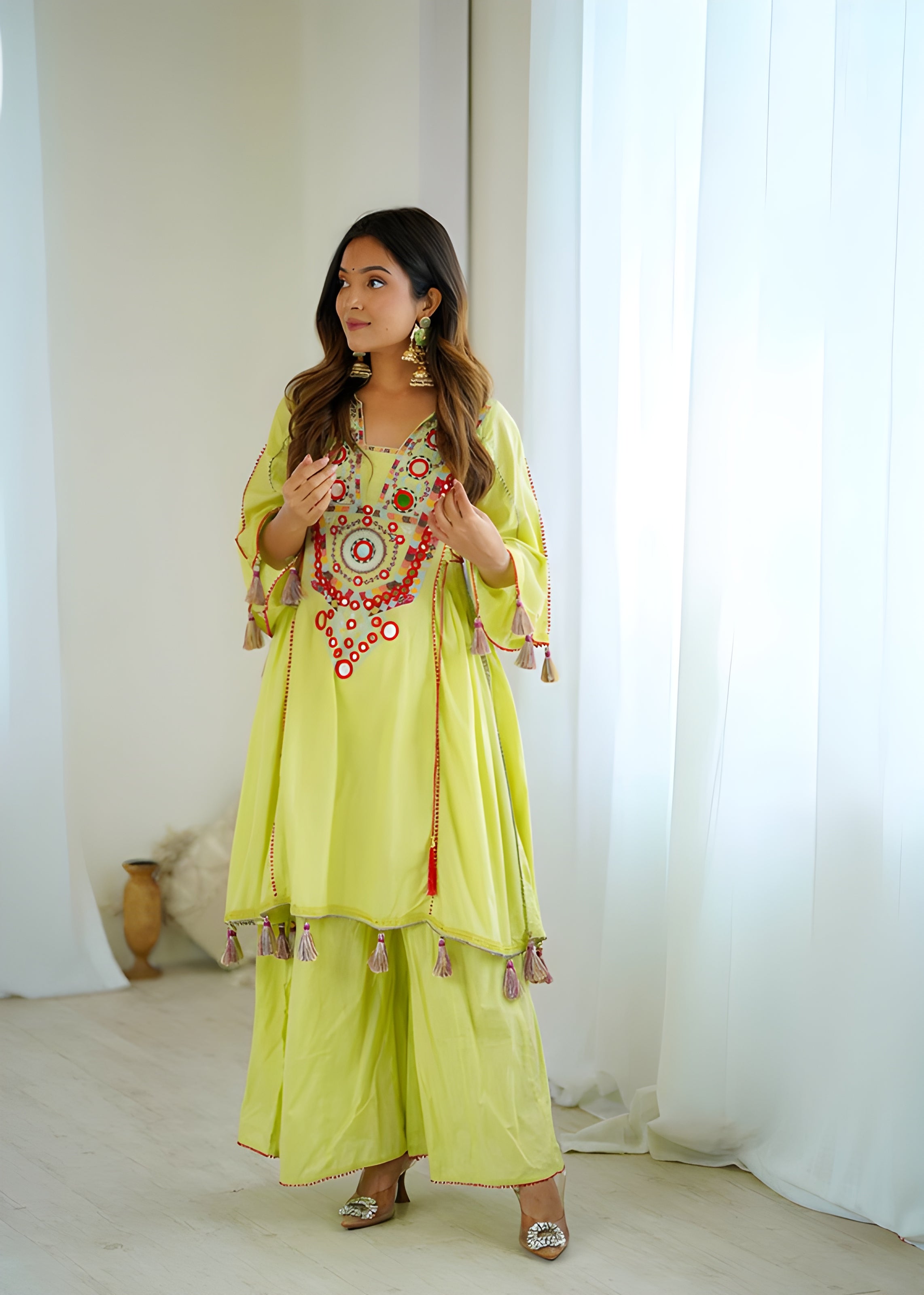 women wearing Jhanvi Tassel Mirror Work Kurta & Palazzo Set - Lahariya.com