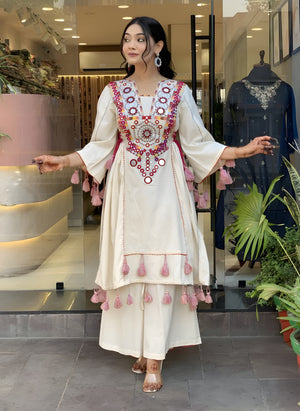 women wearing Jhanvi Tassel Mirror Work Kurta & Palazzo Set - Lahariya.com