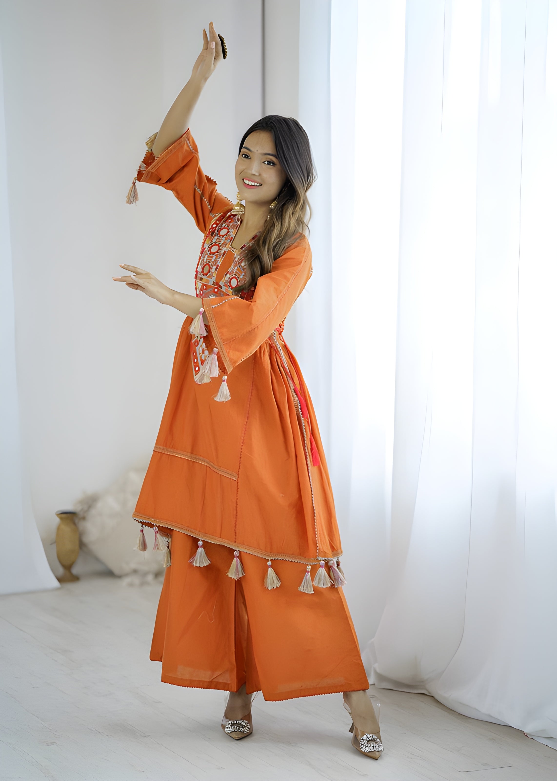 women wearing Jhanvi Tassel Mirror Work Kurta & Palazzo Set - Lahariya.com