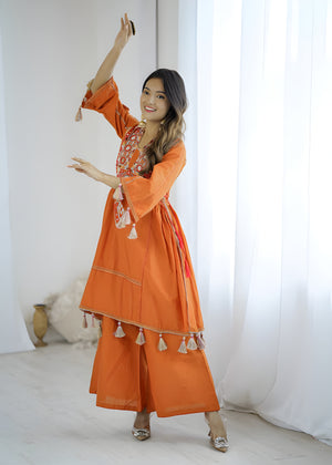 women wearing Jhanvi Tassel Mirror Work Kurta & Palazzo Set - Lahariya.com