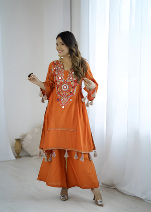 women wearing Jhanvi Tassel Mirror Work Kurta & Palazzo Set - Lahariya.com