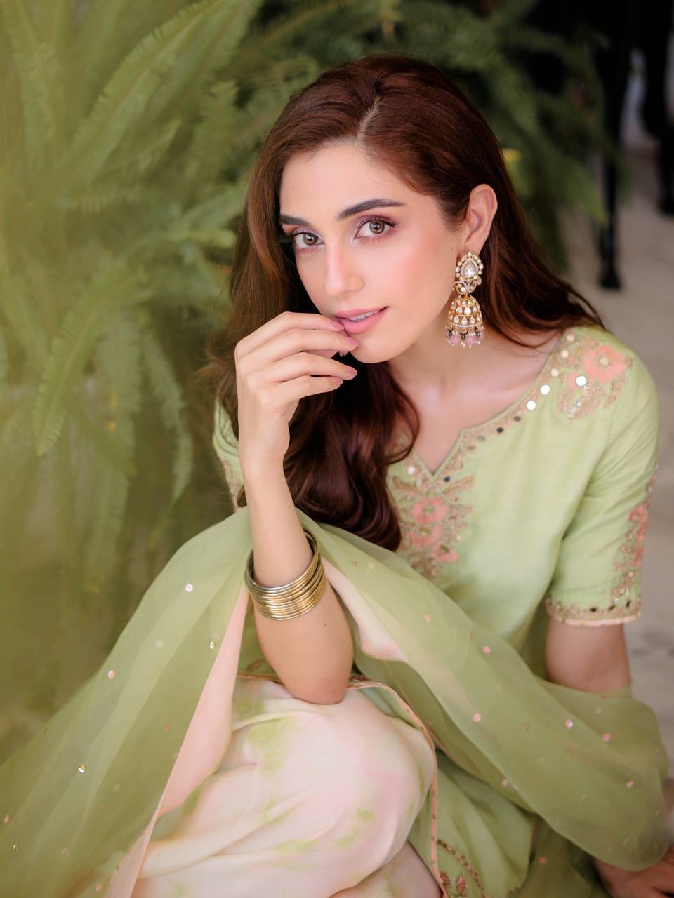 Woman in a Meher Mirror Work Embroidered Palazzo Suit-Lahariya.com