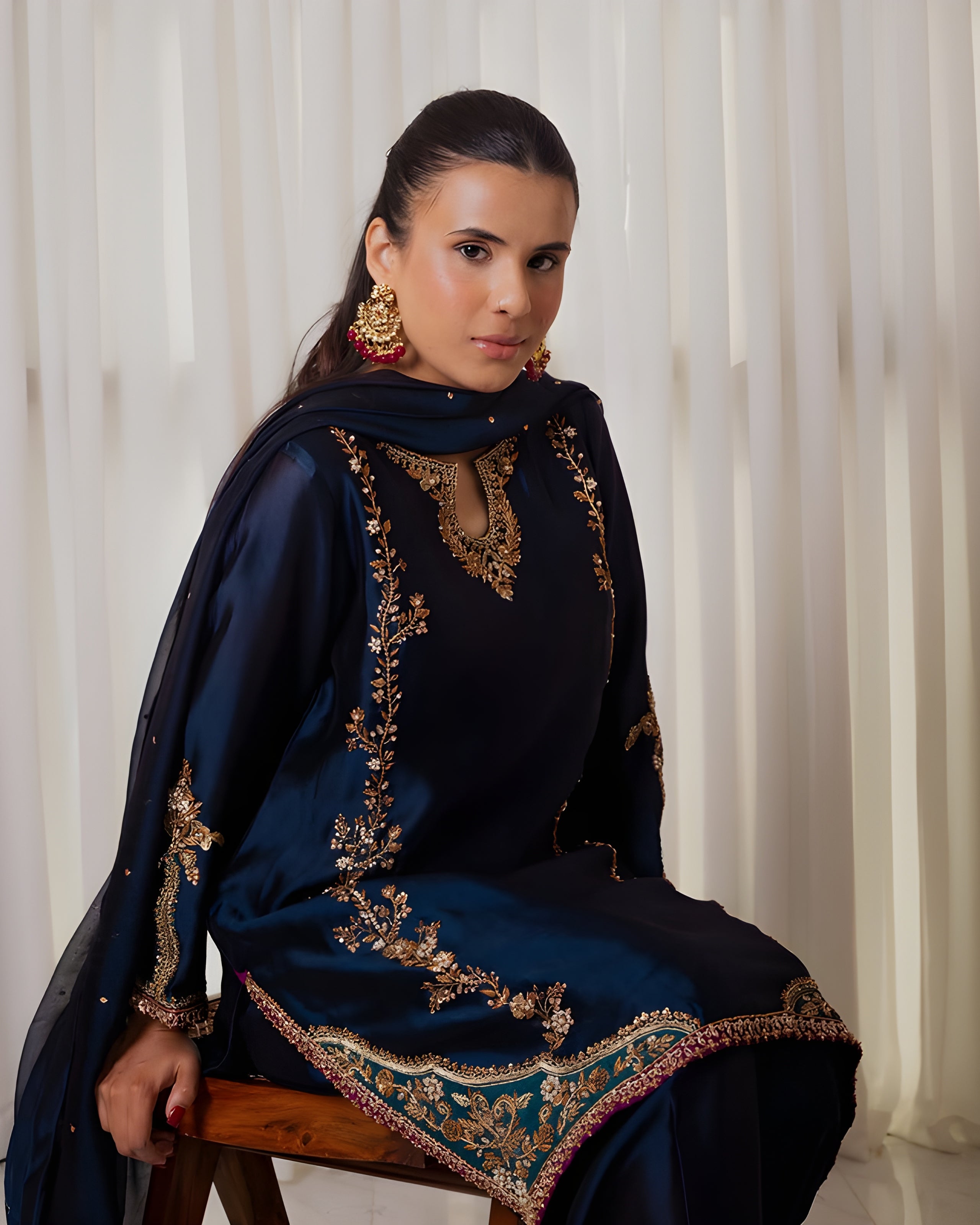 Women wearing Noor Navy Embroidered Salwar Set- Lahariya.com- 1